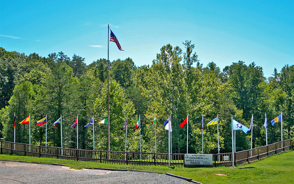 Next to the dining hall we have 19 flag poles to show off exactly which international campers and counselors are present during the week during overnight camp. 