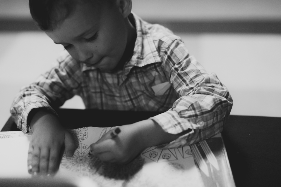 Boy coloring a picture