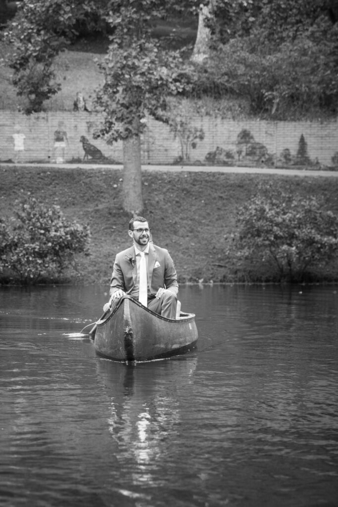 Groom approached the wedding ceremony in a canoe on Friendship lake