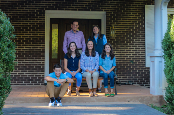 Portrait of the Ackenbom family, founders and owners of this family run camp.