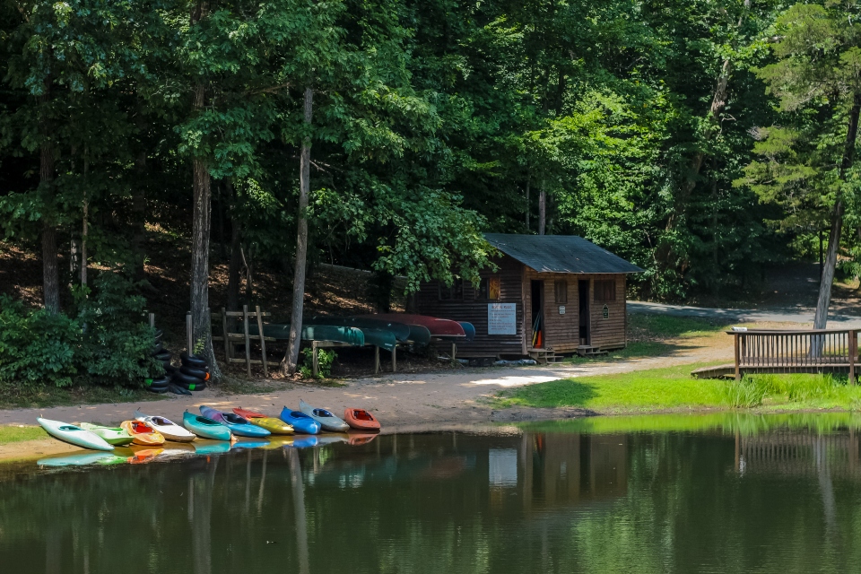 Kayaks on the beach of Camp Friendship Lake 